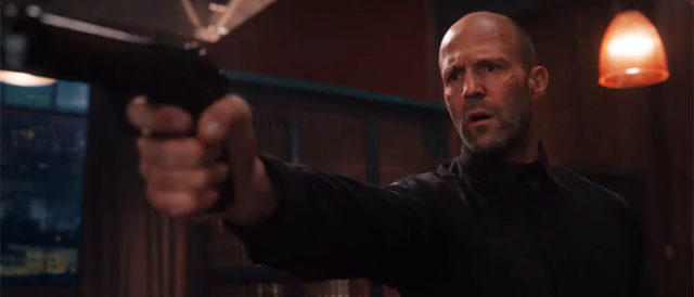 Wrath of Man Jason Statham points a gun